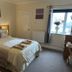 Hogwarts Bed and Continental Breakfast guest room in Sheerness with double bed and window view