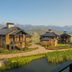 Hotel Yellowstone at Jackson Hole in Jackson with mountain-view cabins beside a pond and valley
