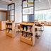 Comfort Hotel Narita in Narita lobby café with bookshelves, tables and large windows
