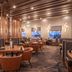 Sandman Signature Ottawa Airport Hotel in Ottawa lounge with leather seating, wood beams and ambient lighting