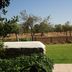 Agroturismo Sa Vinya d'en Palerm in Sant Miquel de Balansat with lawn, trees and fenced countryside view