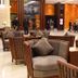 Fullon Hotel Hualien lobby lounge in Hualien City with wicker armchairs and warm wood paneling