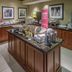Breakfast buffet at Hampton Inn South Haven with coffee urns, pastries and fruit display