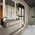 Sixty Beverly Hills bathroom with floating sink, walk-in shower, and toilet in Beverly Hills
