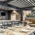 The Burgundy Hotel, Tapestry Collection by Hilton in Little Rock: stylish hotel bar and restaurant with set dining tables
