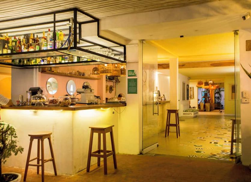 Hotel Barahona Cartagena lobby bar with stools and warm lighting in Cartagena