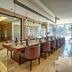 Hideaway at Royalton Punta Cana dining room with long table and resort views in Punta Cana