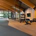 Vier Jahreszeiten Am Schluchsee gym with benches, dumbbells, cable machines and a glass wall
