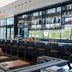 AC Hotels by Marriott Tallahassee Universities at the Capitol lounge bar with floor-to-ceiling windows