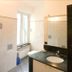 Affittacamere Da Cesare bathroom in Monterosso al Mare with shower, sink, mirror and window