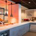 ibis budget Amsterdam Airport breakfast counter with fruit, juices and hot buffet in Badhoevedorp