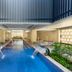 W Punta Cana, All-Inclusive in Uvero Alto indoor pool with loungers and a sleek modern design