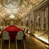 Posta Donini 1579 - Una Esperienze in San Martino in Campo, ornate frescoed banquet room with long red table