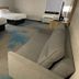Days Inn by Wyndham Jefferson City guest room with two beds, sofa, and patterned carpet