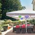 Waldhotel Bärenstein in Horn-Bad Meinberg outdoor terrace with umbrellas, wicker chairs, and colorful lanterns