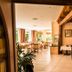 Hotel Knorre in Meissen dining room with bar counter, stools, and bright seating area