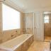 Royal Hideaway Playacar bathroom with soaking tub, walk-in shower and double vanity in Playa del Carmen