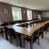 Hôtel La Métairie in Cordes-sur-Ciel conference room with long U-shaped meeting table and chairs