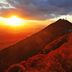 Sunset mountain view from Hotel Jal City Tsukuba in Tsukuba, with glowing sky and red hillside.