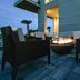 Fire pit seating at Residence Inn by Marriott Myrtle Beach Oceanfront in Myrtle Beach at dusk