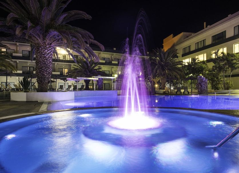 Night view of fountain-lit pool at Kn Hotel Matas Blancas - Solo Adultos in Pájara