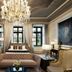 H15 Palace, a Luxury Collection Hotel, Krakow suite with crystal chandelier, tufted sofa and large windows
