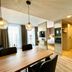 Zeitwohnhaus Suite-Hotel & Serviced Apartments in Erlangen: modern suite with dining table, sofa and kitchenette