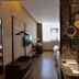 James Joyce Coffetel San Yuan LI Station Guangzhou room with vanity, TV, beds and window view