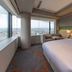 Jr Kyushu Hotel Kumamoto guest room with large window city view in Kumamoto