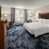 Fairfield by Marriott Inn & Suites Portland West/Beaverton room with king bed, desk, and window seating in Beaverton