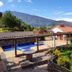 Casa de Campo Hotel & Spa in Villa de Leyva: mountain view terrace with outdoor pool and garden