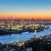 Ibis Hamburg Alsterring in Hamburg with panoramic harbor and city skyline at sunset