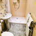 Loch Kinord Hotel in Aboyne bathroom with shower, sink, bathtub and towel radiator