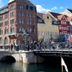 Hotel Bethel in Copenhagen overlooking a canal and bridge beside colorful waterfront buildings