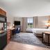 Candlewood Suites Cape Girardeau by IHG guest room with kitchenette, desk, bed and window view