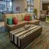 Residence Inn by Marriott Norfolk Downtown lobby seating area with sofa, chairs and coffee table in Norfolk