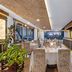 Golden Tulip Westlands Nairobi dining room with set tables and bar overlooking Nairobi skyline
