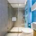 Home Inn Neo Shenzhen Dongmen Pedestrian Street Shaibu Metro Station bathroom with glass shower and blue tiles