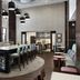 Hampton Inn & Suites El Paso-East lobby with bar seating, lounge chairs, and tall windows