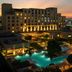The Santa Maria, a Luxury Collection Hotel & Golf Resort, Panama City with illuminated pool and resort at sunset