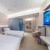 Hanting Hotel Shenyang Santaizi Metro Station guest room with two single beds in Shenyang