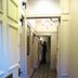 Station Hotel And Restaurant in Melrose hallway with patterned tile floor and wall lights