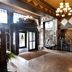 The Giacomo, an Ascend Collection Hotel in Niagara Falls lobby with chandelier and geometric wood ceiling
