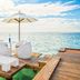 Be Live Experience Hamaca Suites in Boca Chica: overwater lounge with umbrella and ocean view