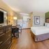 Extended Stay America Suites - Bakersfield - California Avenue room with bed, kitchenette and desk