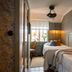 Strandvillan Hotell och Bed & Breakfast in Lysekil: cozy twin room with patterned walls and window seating