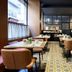 Aurea Catedral by Eurostars Hotel Company Granada dining room with tables and upholstered chairs