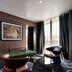 Athenswas Design Hotel Athens guest room with seating area and city-view windows