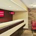 Red Roof Inn Detroit - Farmington Hills lobby with front desk and seating area