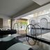 The Westin Miyako Kyoto indoor pool with lounge chairs and arched stone wall in Kyoto